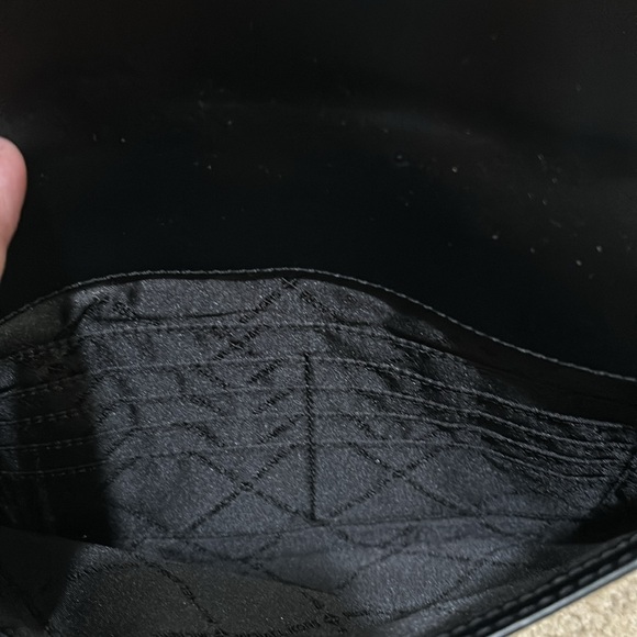 Michael Kors clutch with magnetic closure . Large enough to hold several items - Picture 3 of 5